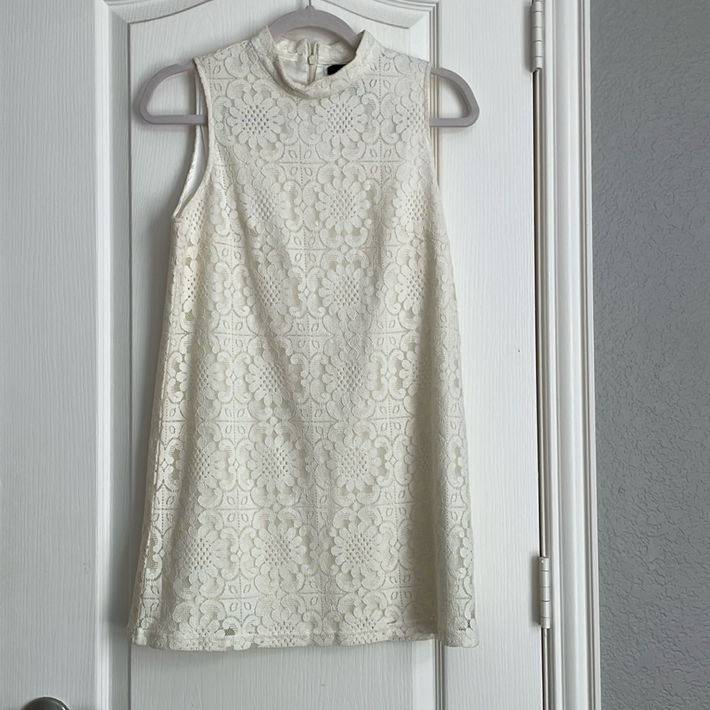 Used halter creme dress-